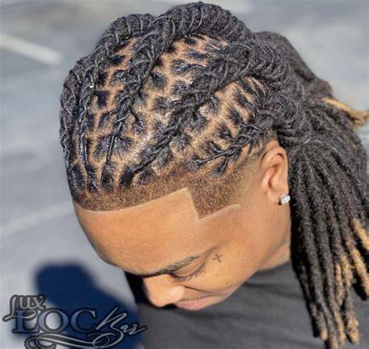 A loosely hanging side dreadlocks A loosely hanging side dreadlocks