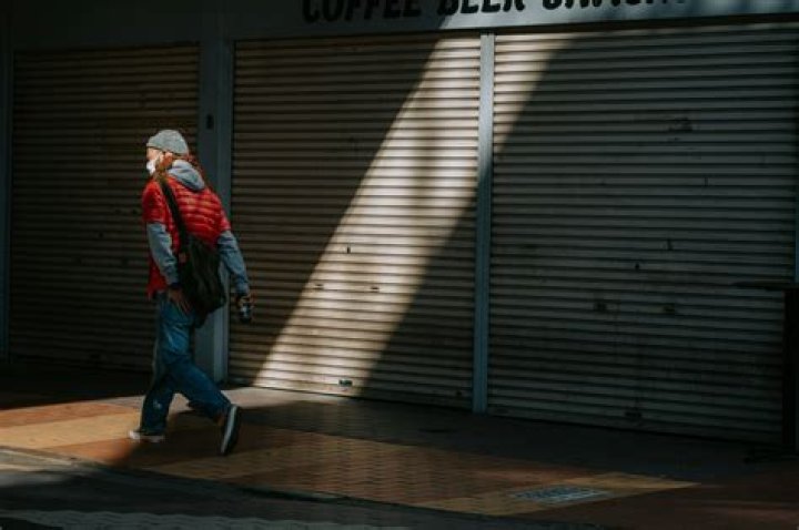 A man walks past a bitcoin poster in Hong Kong on April 15, 2024 A man walks past a bitcoin poster in Hong Kong on April 15, 2024
