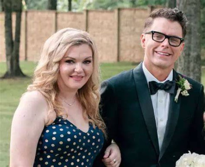 Bobby Bones and his sister Amanda Estell during an event Bobby Bones and his sister Amanda Estell during an event