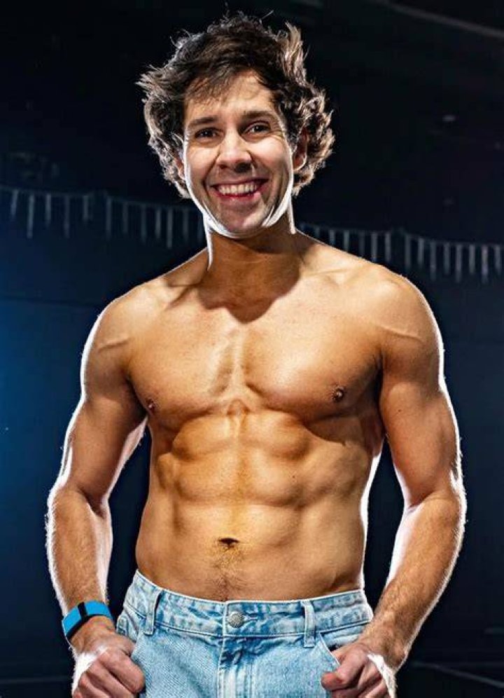 David Dobrik posing for a photo in Paris