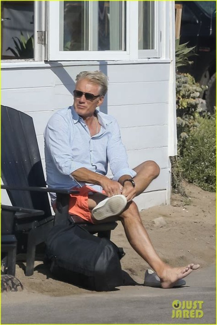 Dolph Lundgren relaxes on the Marbella beach with ex-wife Anette Qviberg and eldest daughter Ida in 2017 six years after the couple's divorce