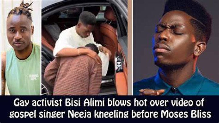 Neeja kneeling for singer Moses Bliss. Neeja kneeling for singer Moses Bliss.