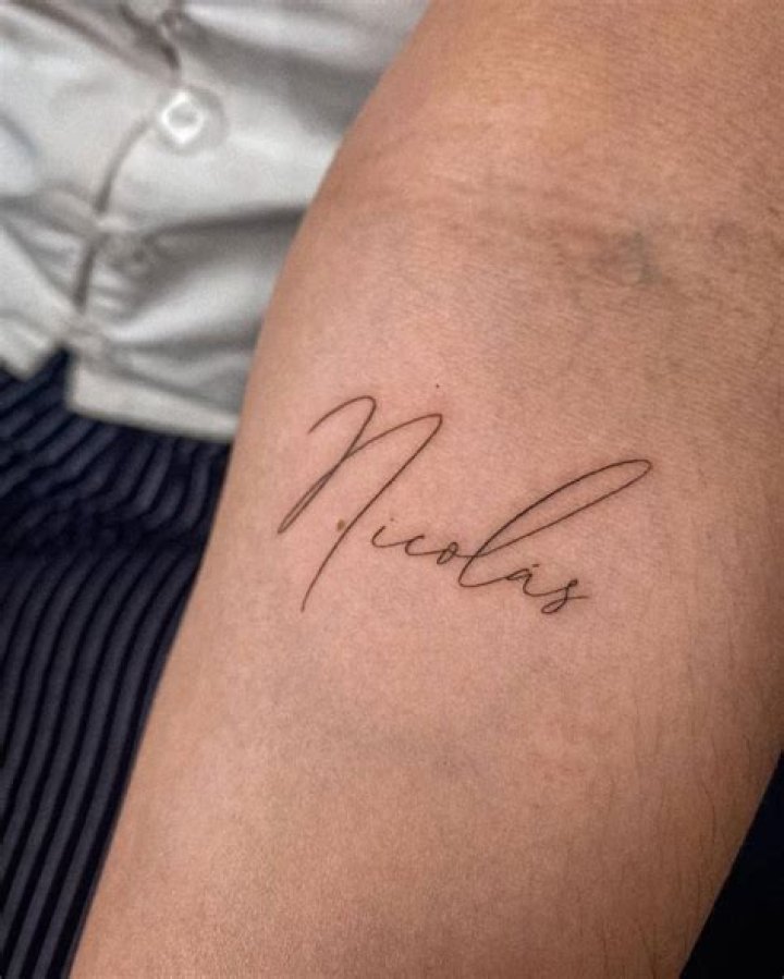 Nicolas tattoo